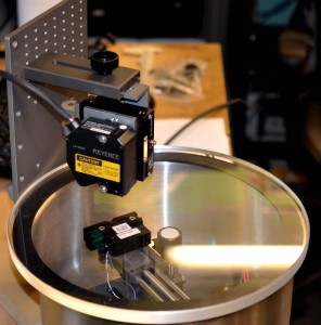 Microspeaker being measured with a laser in one of our vacuum chambers.